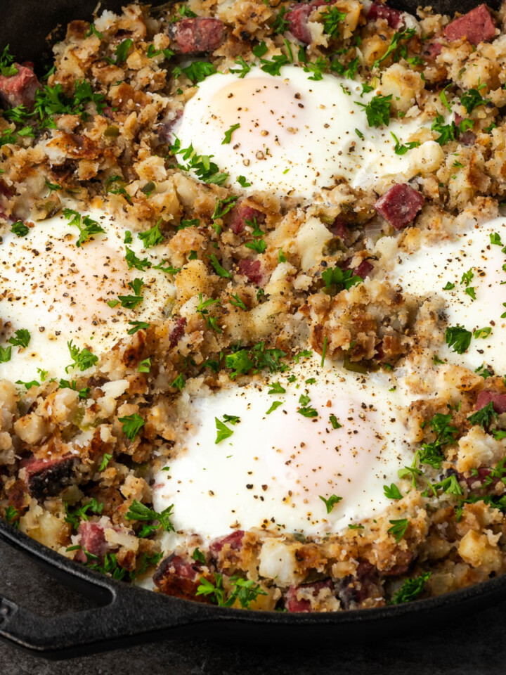 Pastrami hash in a skillet.