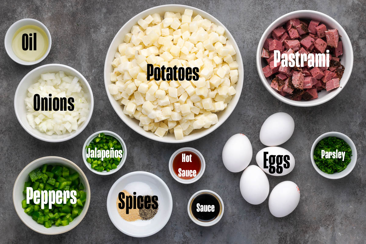 Ingredients to make this hash in bowls on a table.
