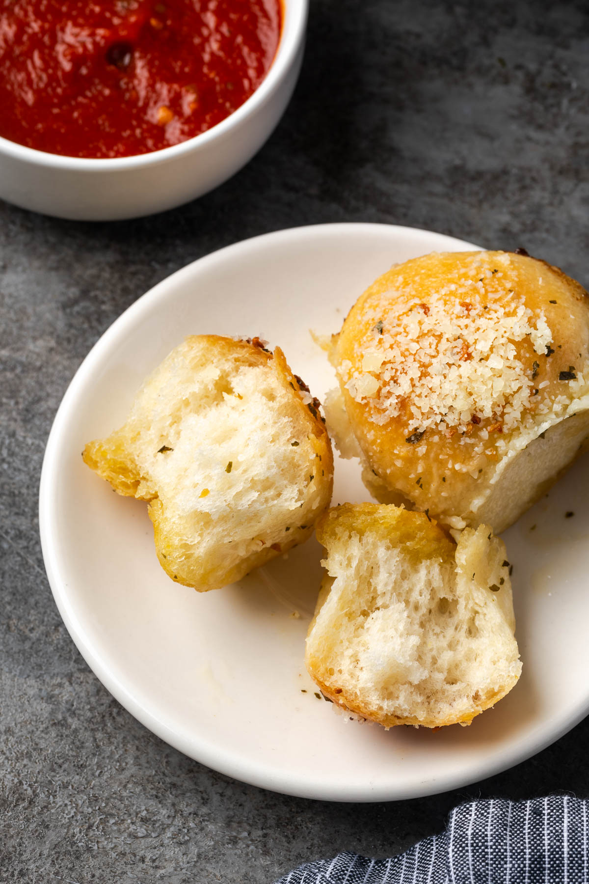 Parmesan garlic pull apart bread on a plate.