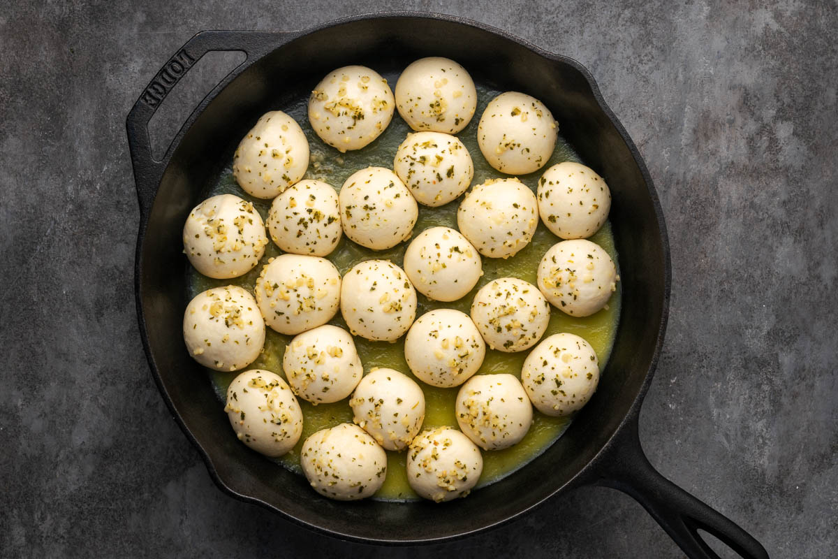 Balls flipped halfway while cooking.