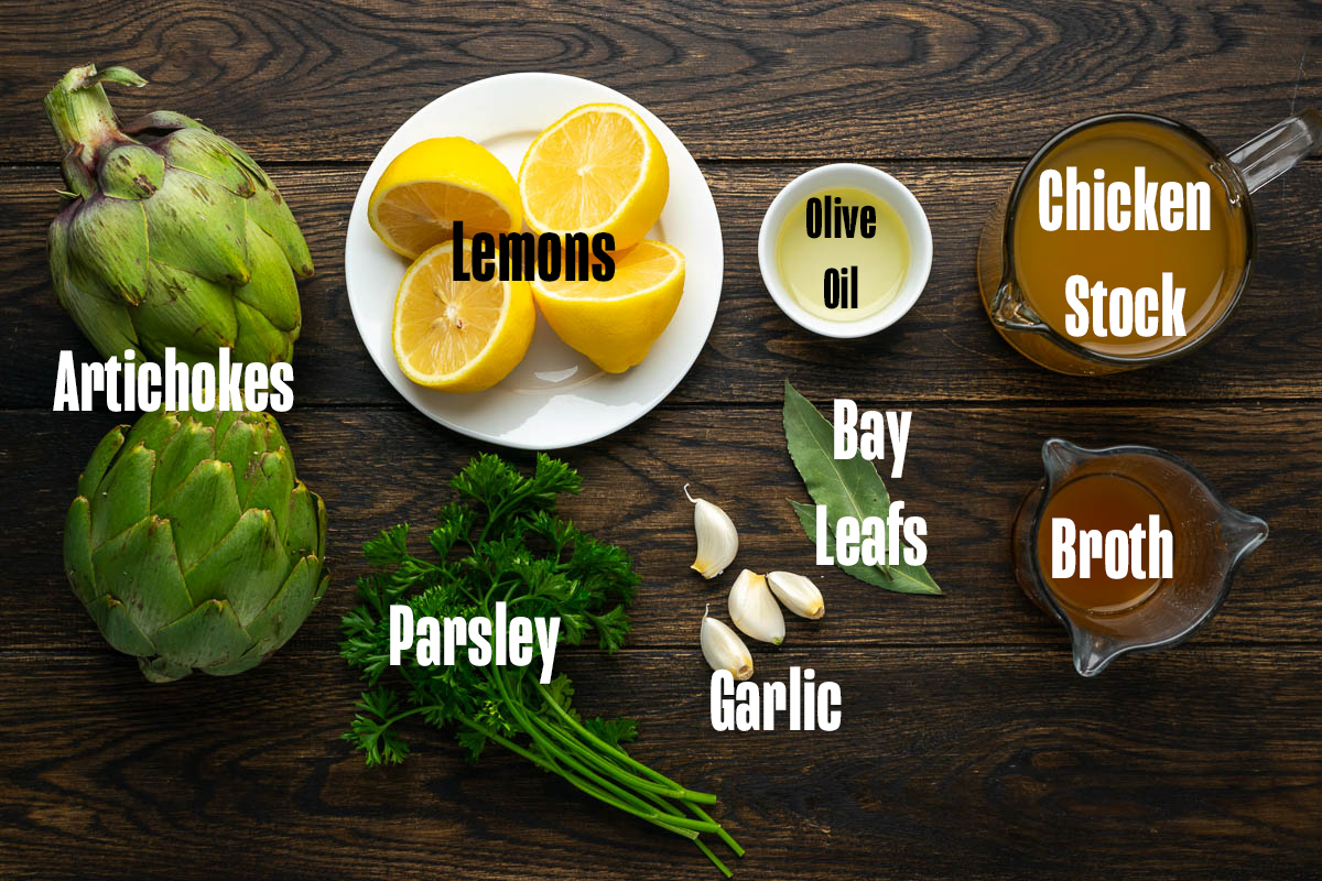Ingredients to make these artichokes on a table.