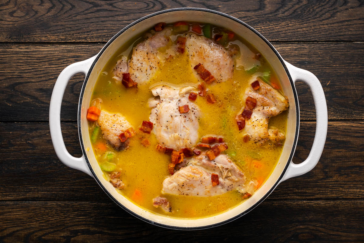 Chicken cooking in the sauce.