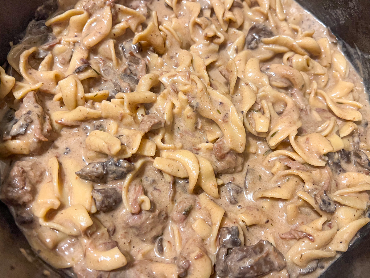 Noodles and beef mixed into the creamy stroganoff sauce. 