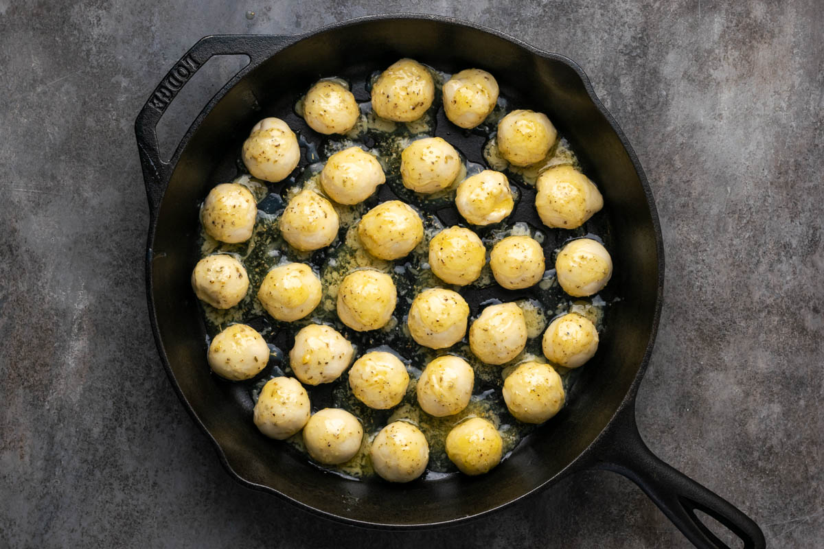 Rolls added to the skillet.