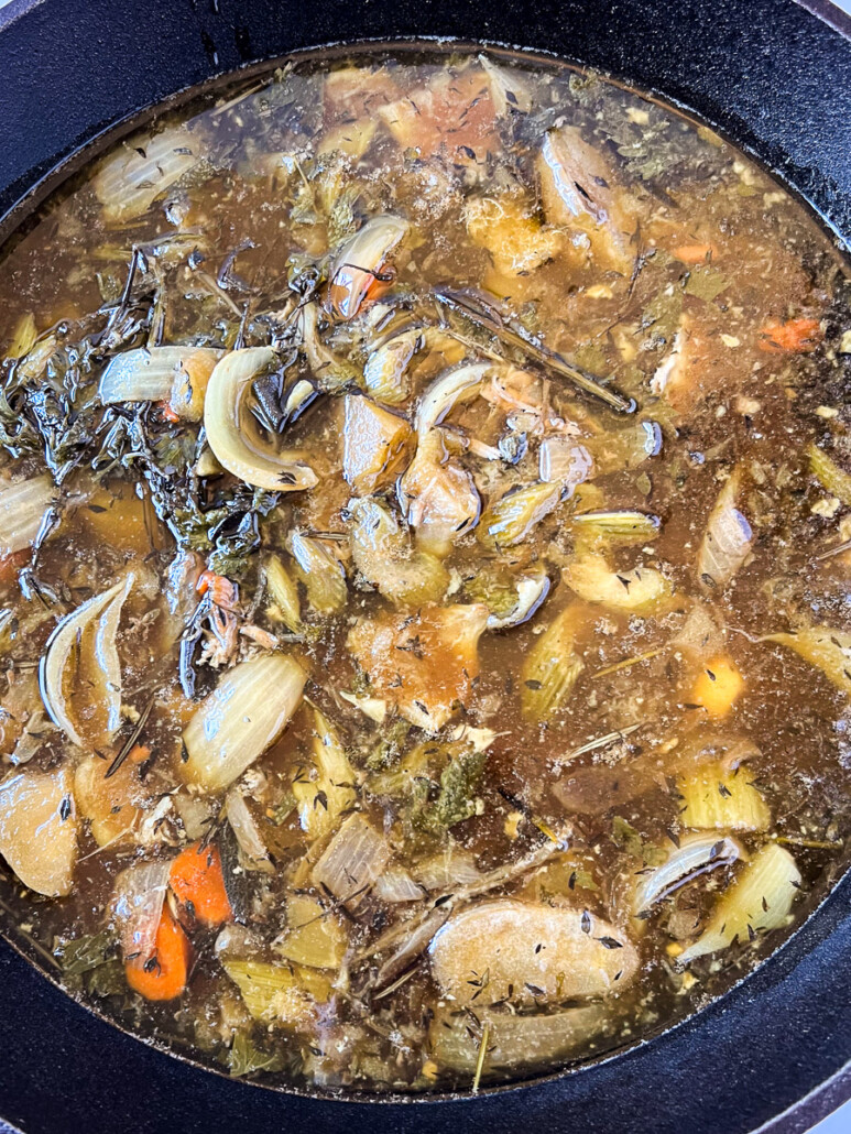Pan drippings with all the produce and herbs used to roast the turkey.