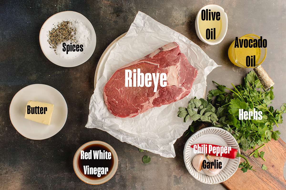 Ingredients to make this steak on a table.