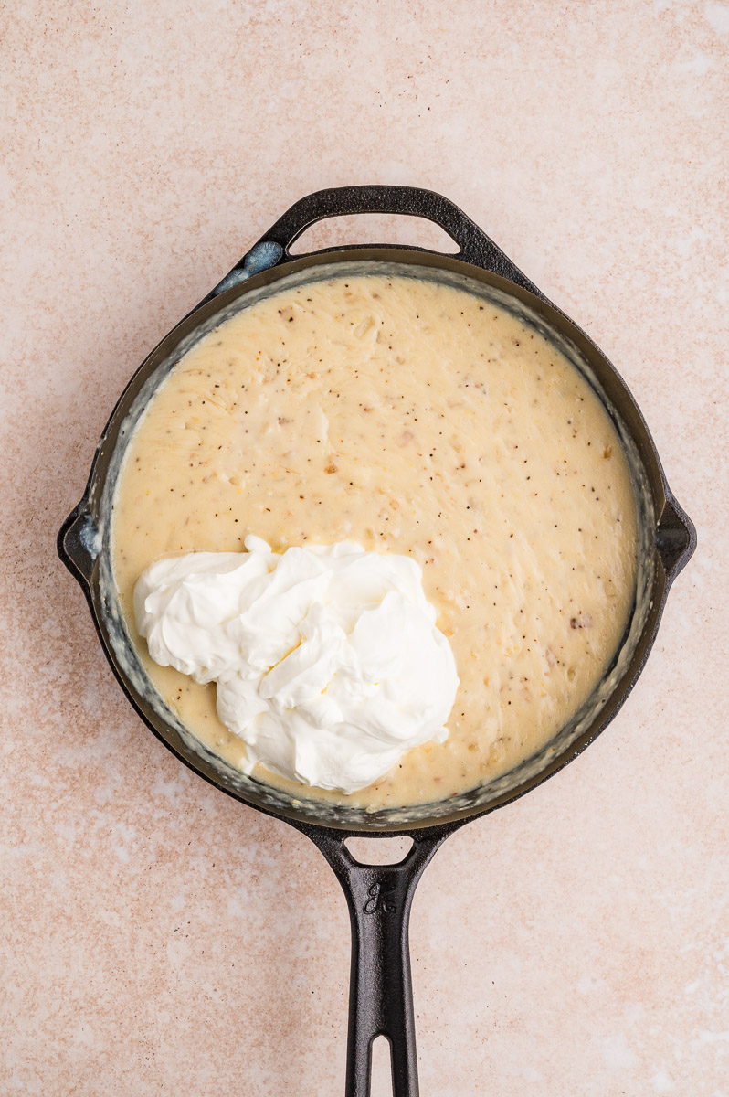 Sour cream added to the cheesy potatoes sauce.