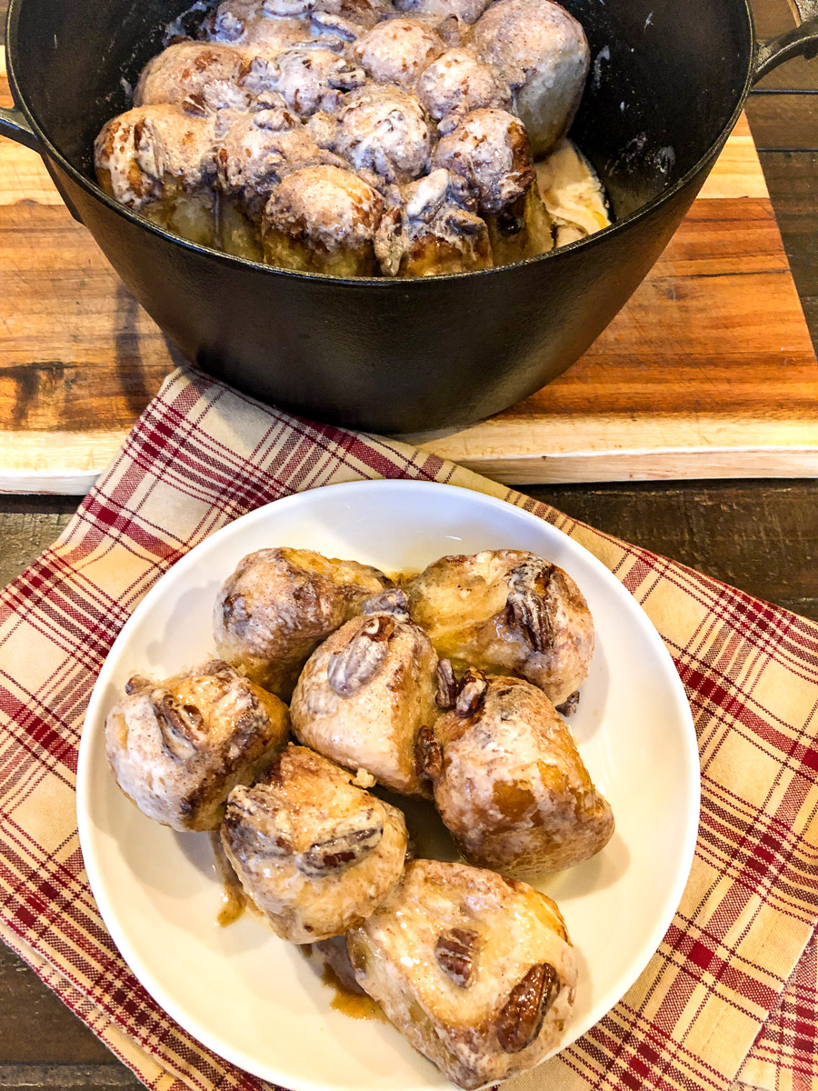 Dutch oven cinnamon rolls on a plate.