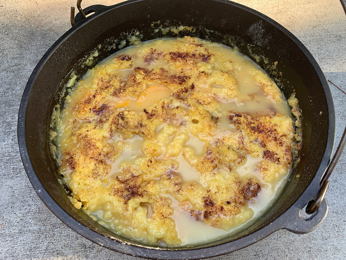 Dutch oven peach dump cake after cooking.