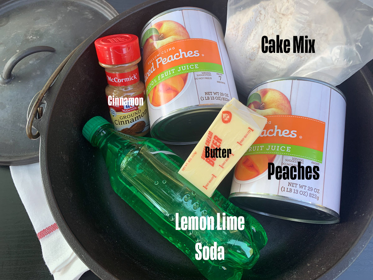 Ingredients to make a peach dump cake on a table.