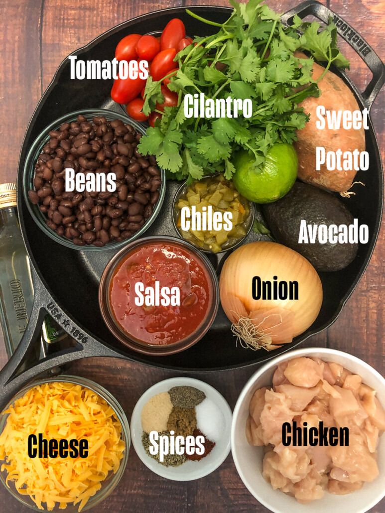 Ingredients for Mexican Chicken Sweet Potatoes in a skillet.