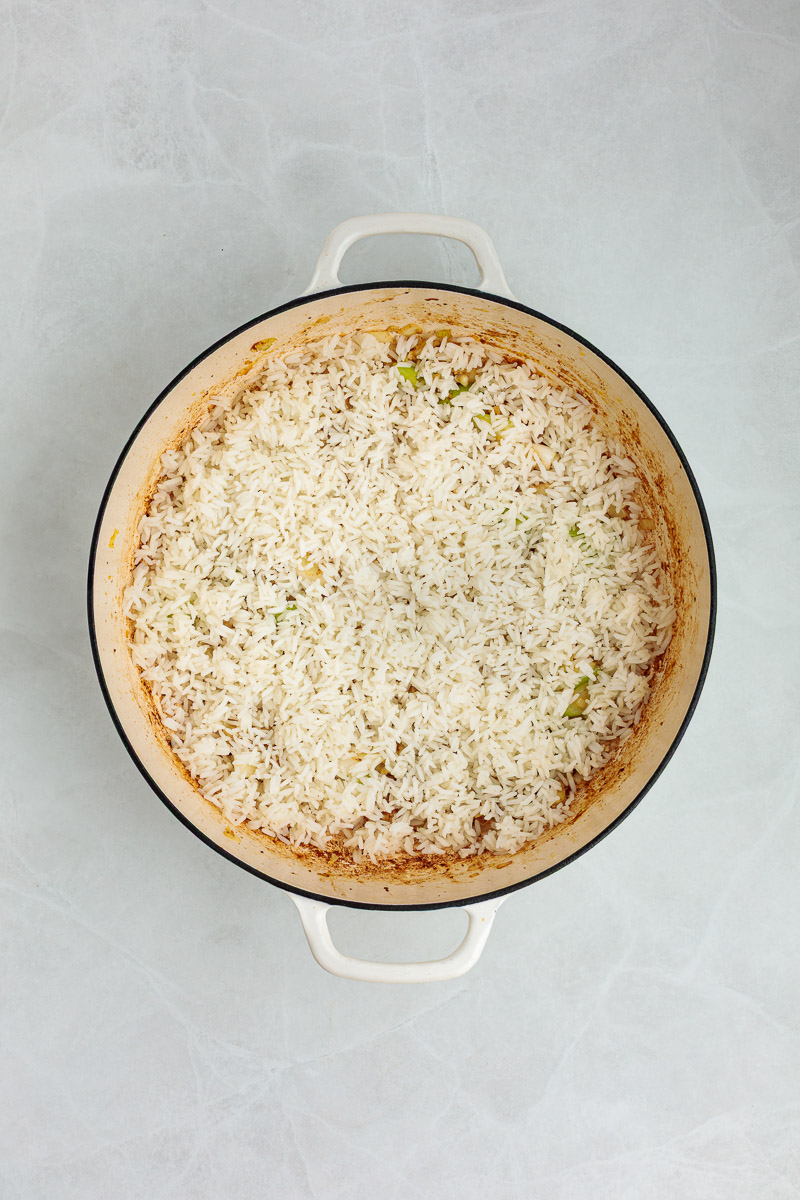 Rice added to the pan.