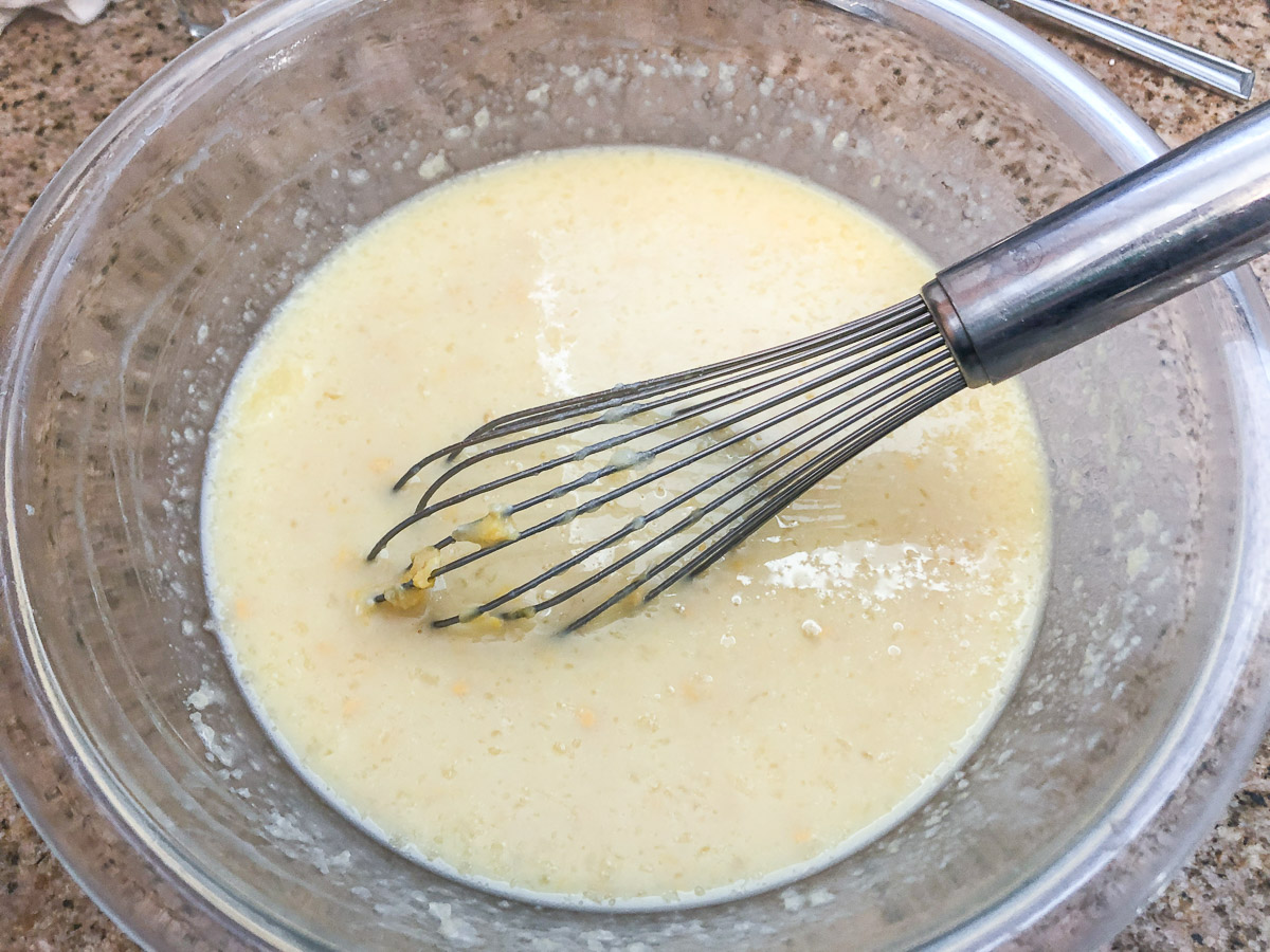 Egg mixture whisked in a bowl.