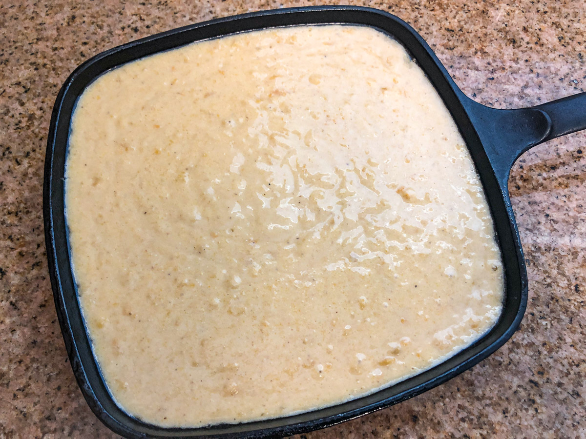 Batter poured into the cast iron skillet.