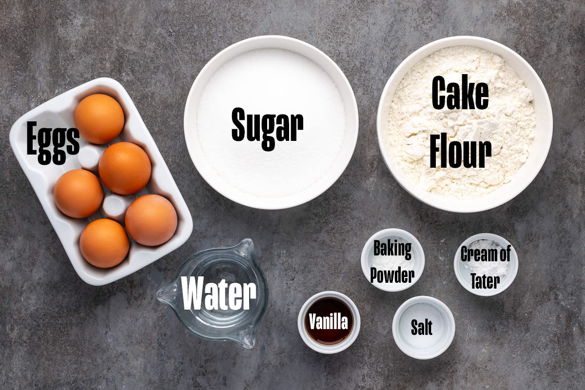 Ingredients to make an Angel Food cake on a table.