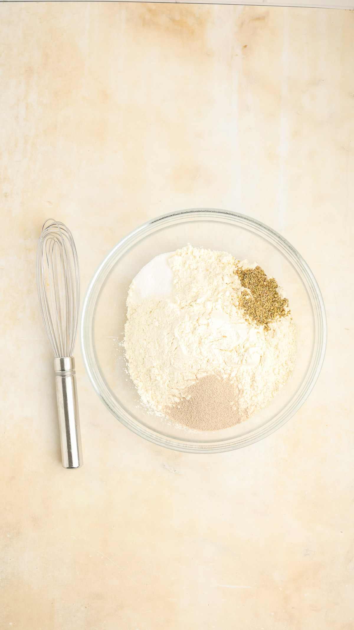 Hand mixer with ingredients for Artesian Italian Bread.