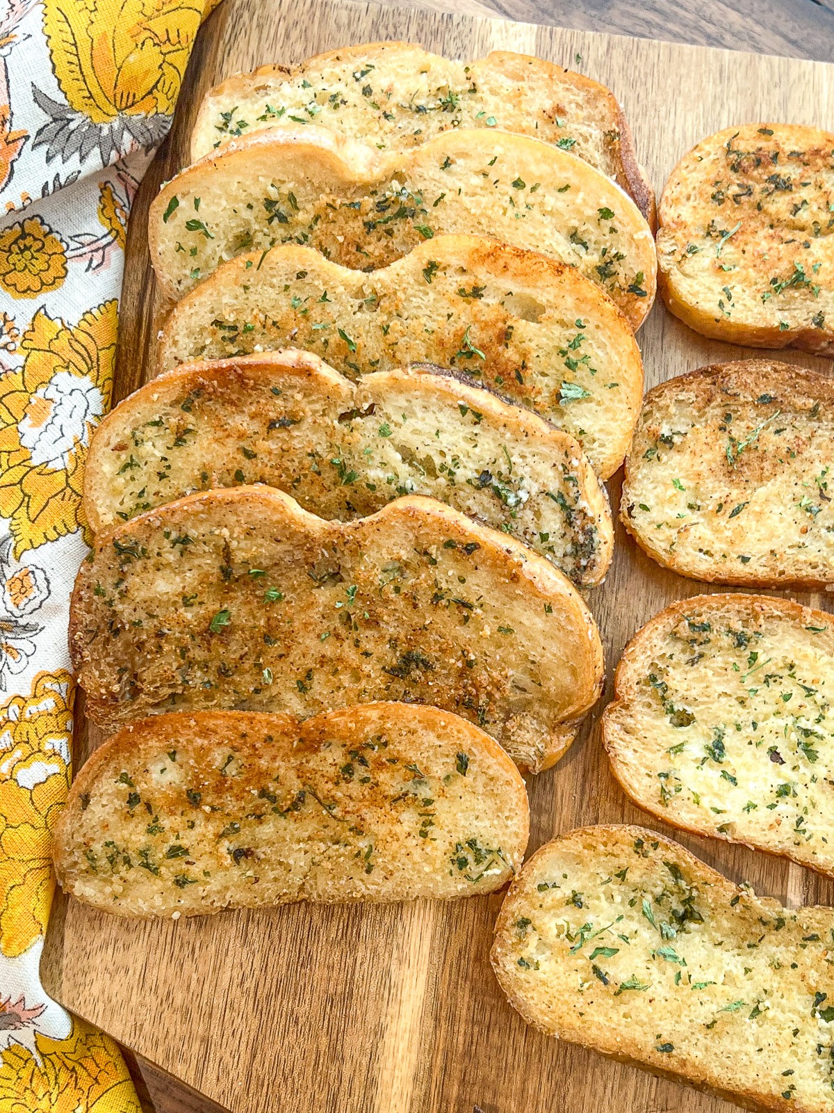 Image of slices of garlic bread on a cutting board