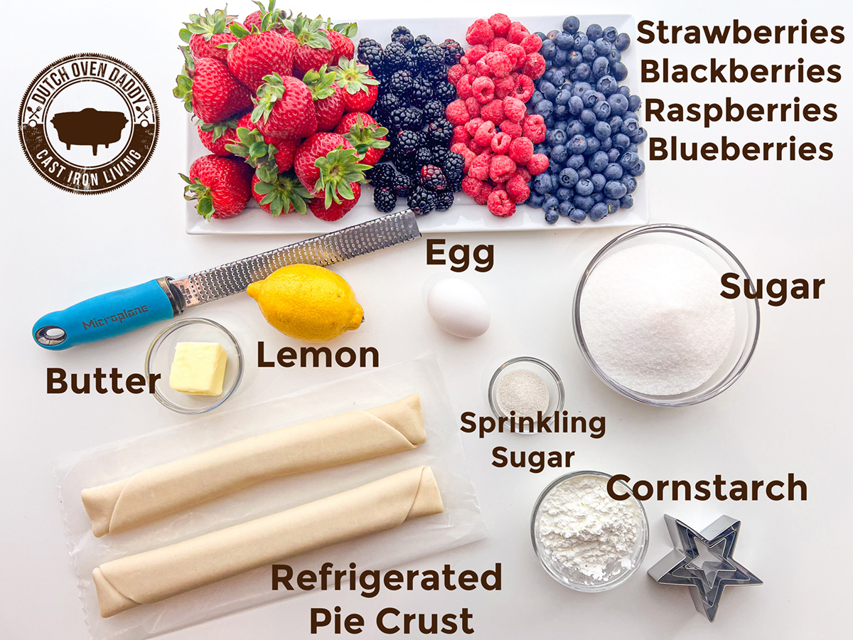 Ingredients for cast iron skillet berry cobbler laid out on a surface