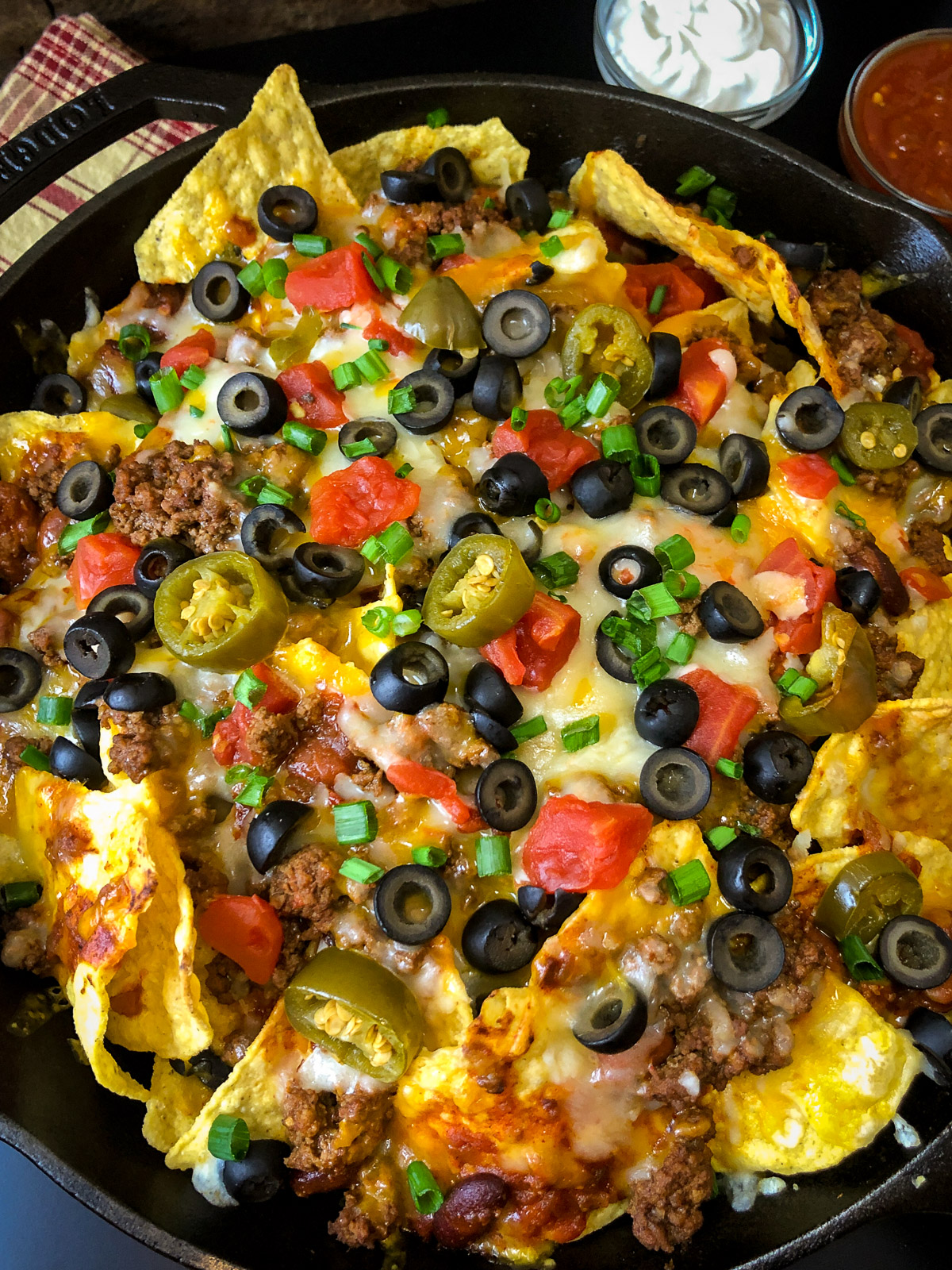 Close up view of freshly baked cast iron skillet nachos