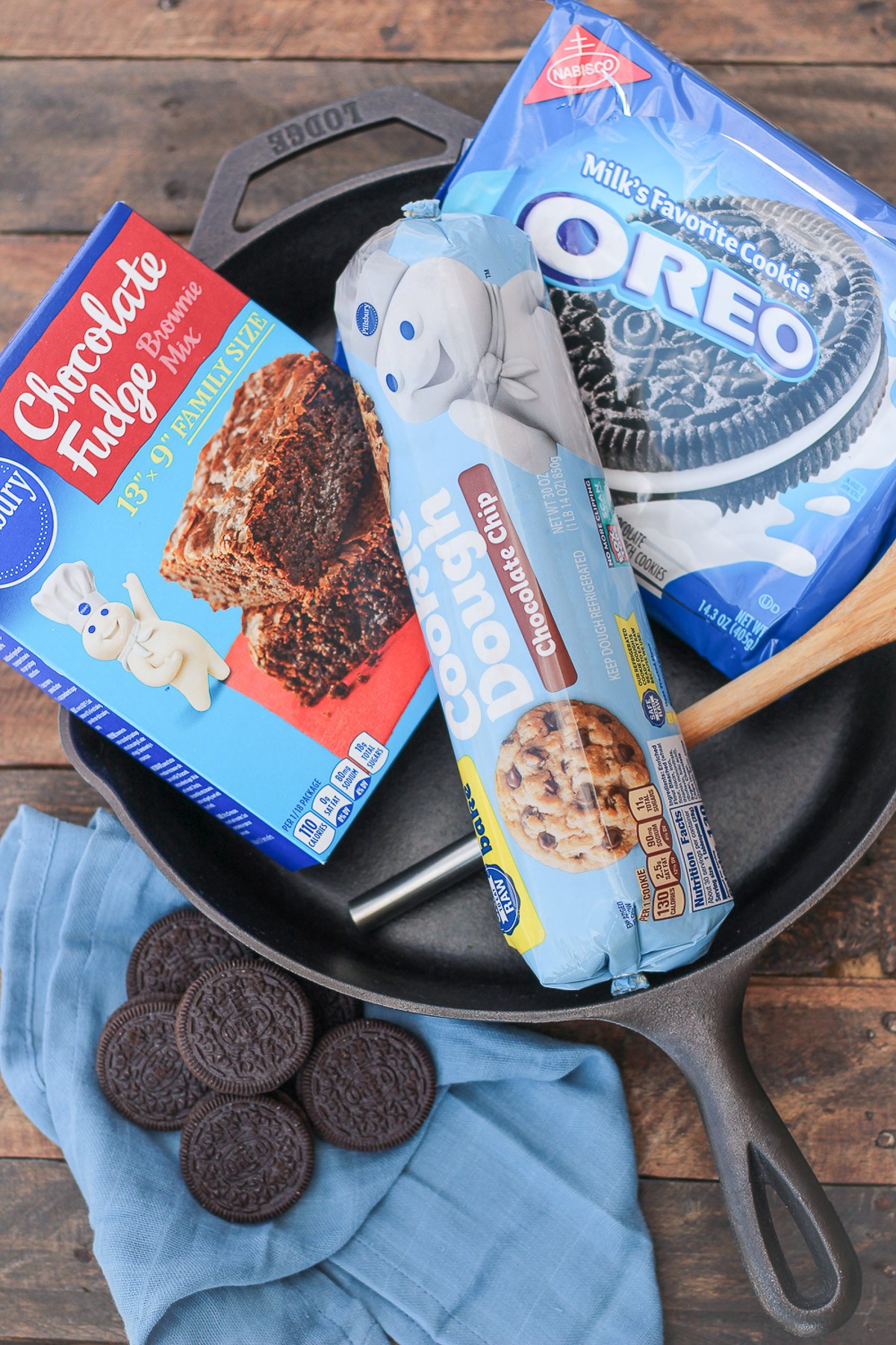 Ingredients to make chewy fudge chocolate brookies placed in a cast iron skillet.