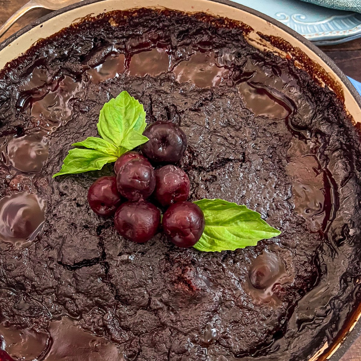 Cola chocolate cherry cake baked in a cast iron skillet.