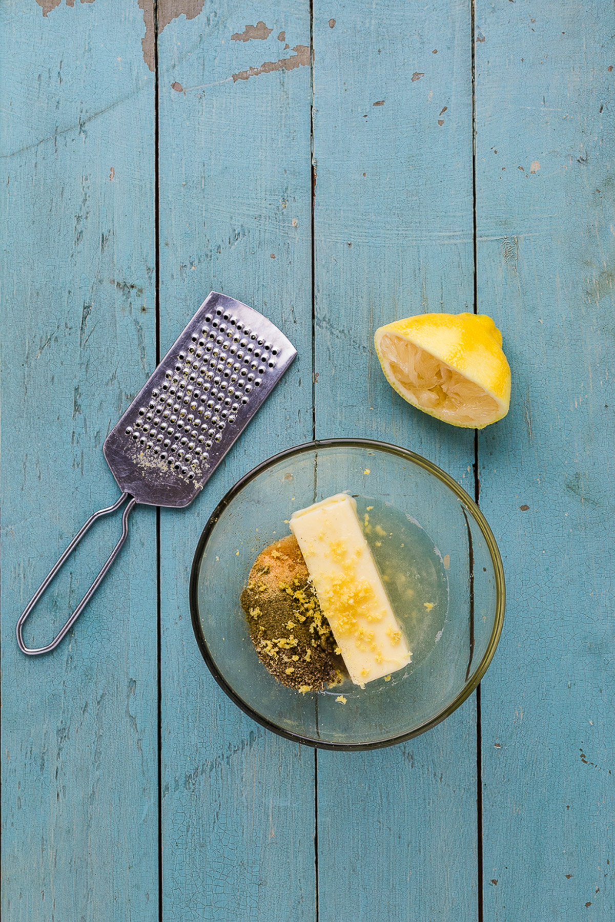 Lemon herb butter mixture with sage thyme and lemon zest for dutch oven chicken