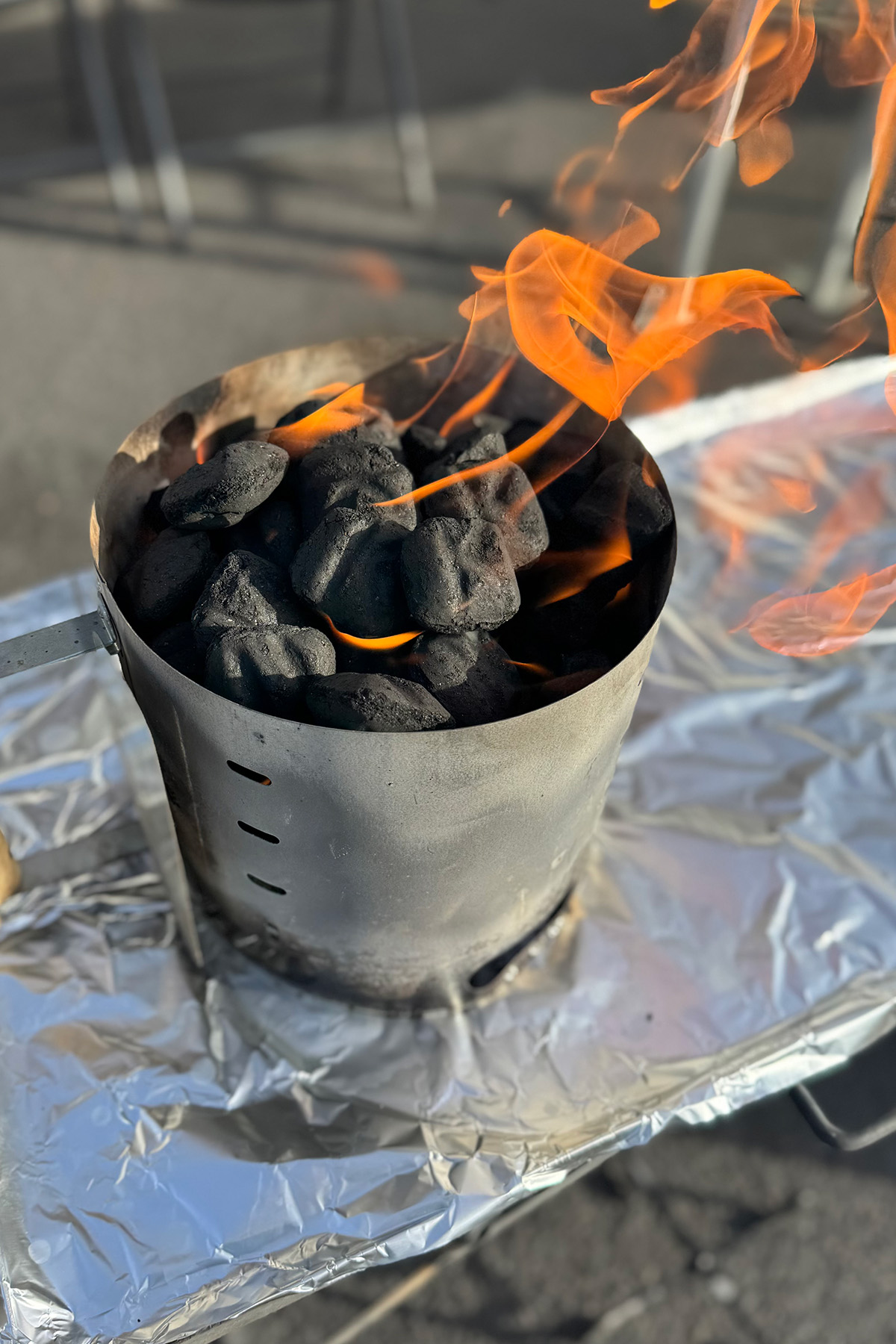 Charcoal lit for Dutch Oven Peach Cobbler.