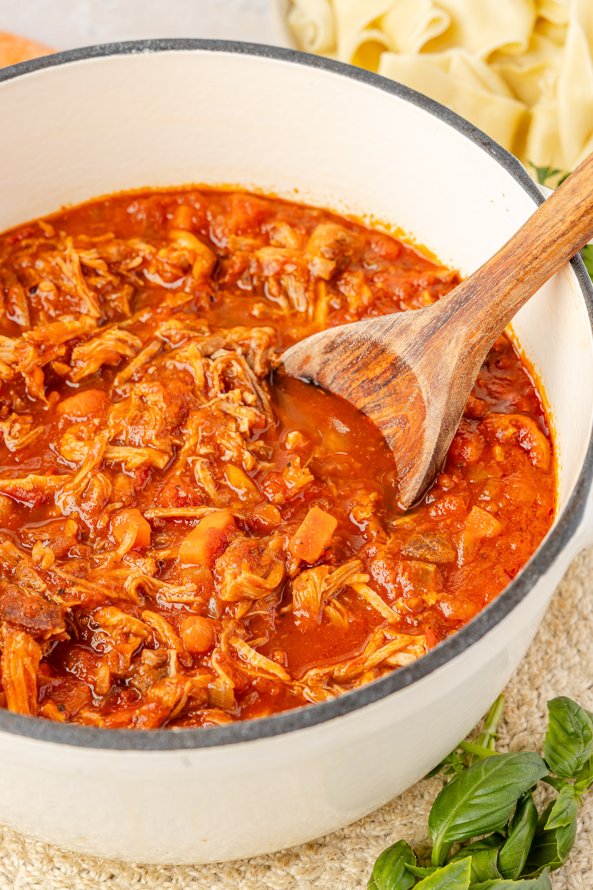 A Dutch oven of pork ragu.