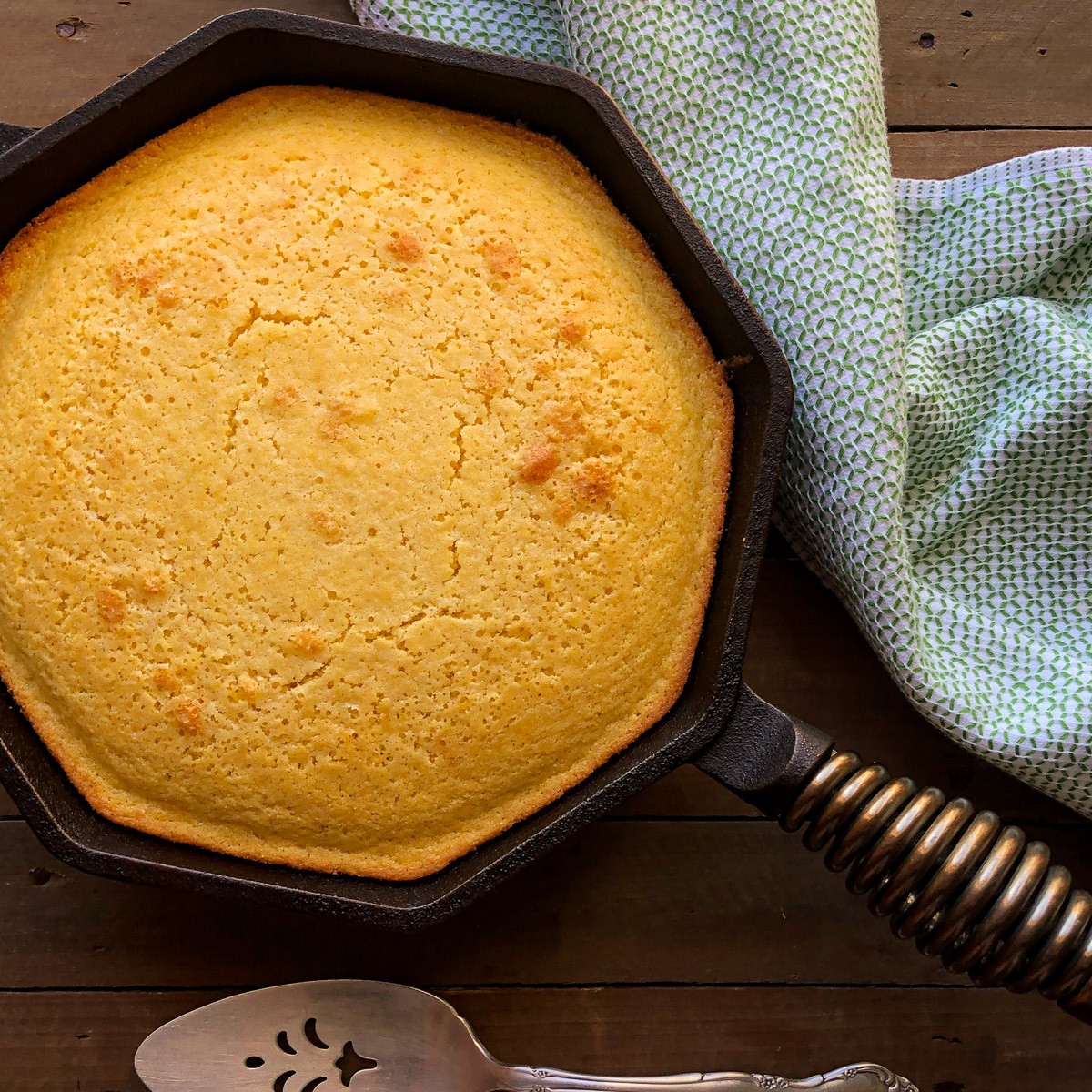 Cast iron sweet cornbread with a golden crust.