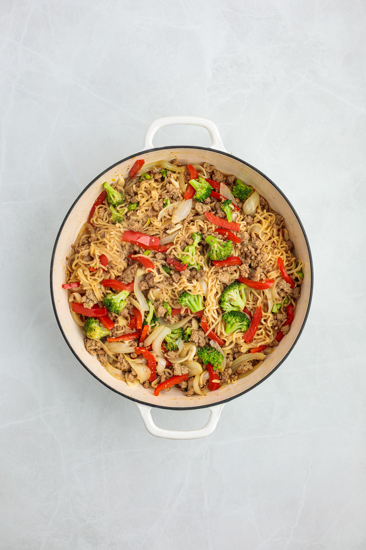 All the ingredients for the turkey stir fry in a pot.