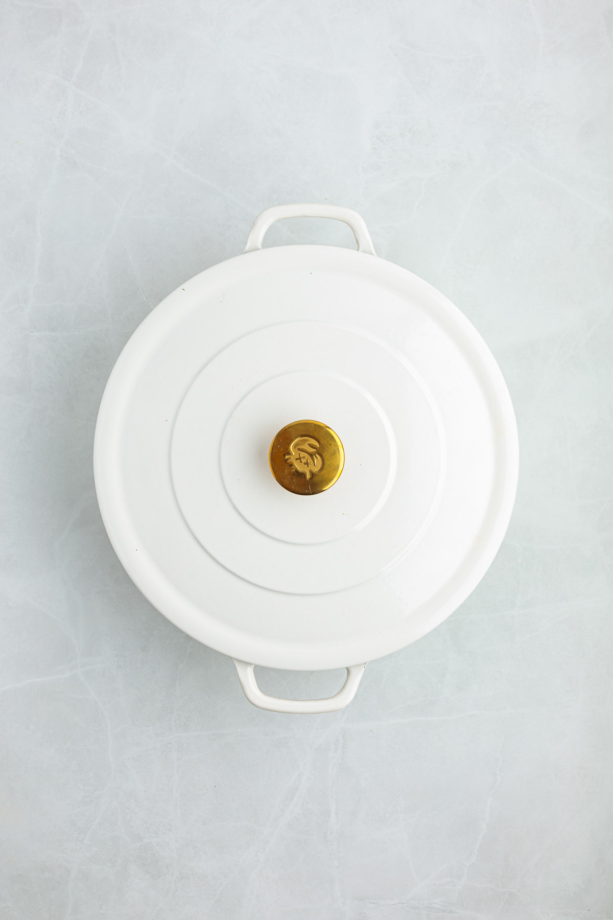 Pot with a lid on it.