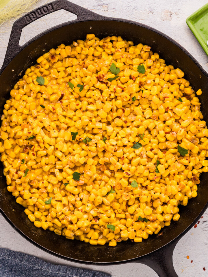Hot Honey Butter Skillet Corn in a cast iron skillet.