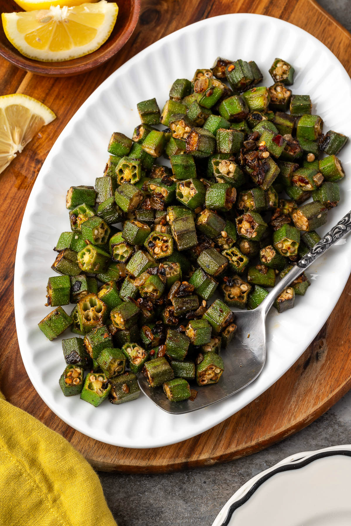 Pan-fried okra with onions and garlic on a plate.