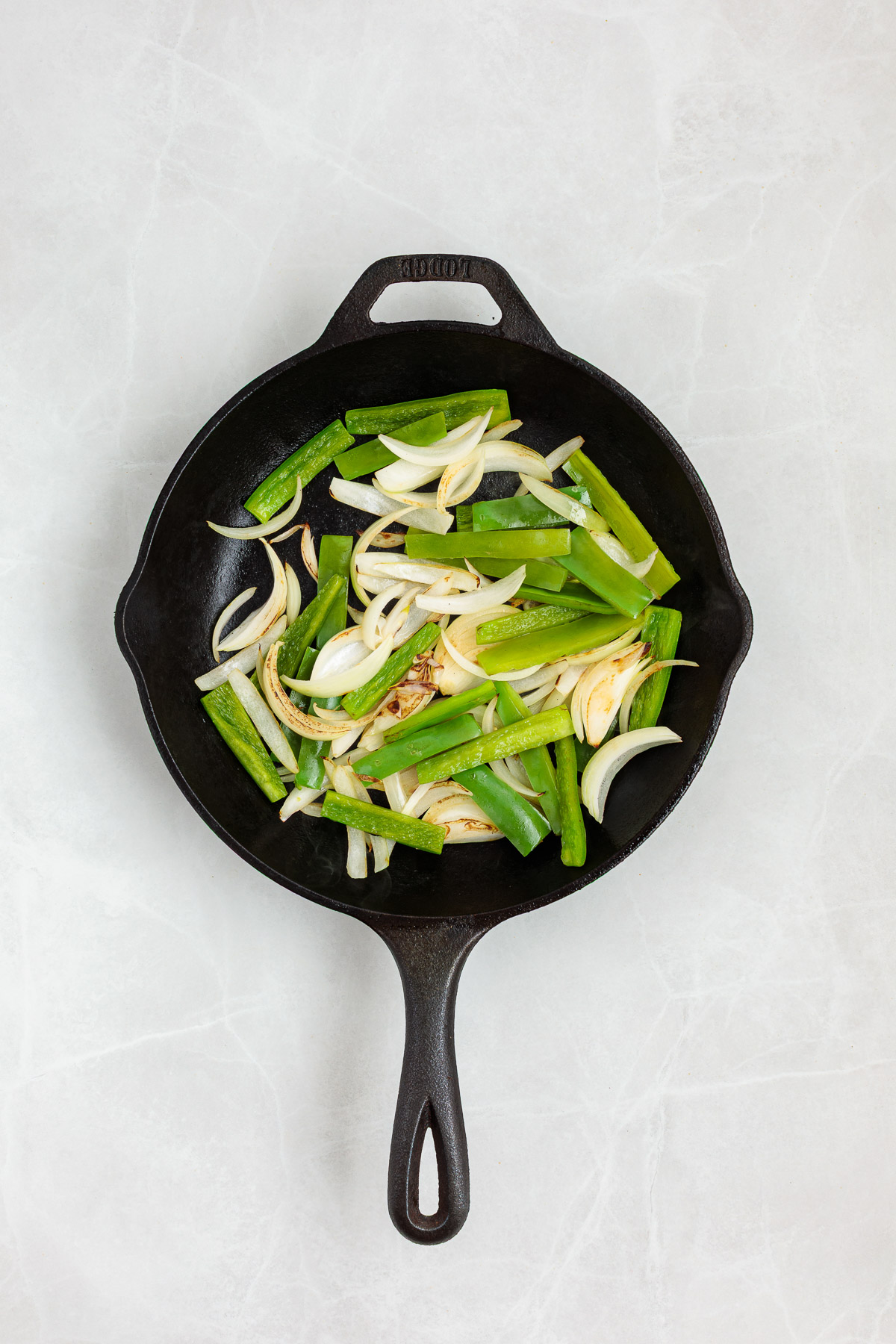 Step 3, flash frying the vegetables.