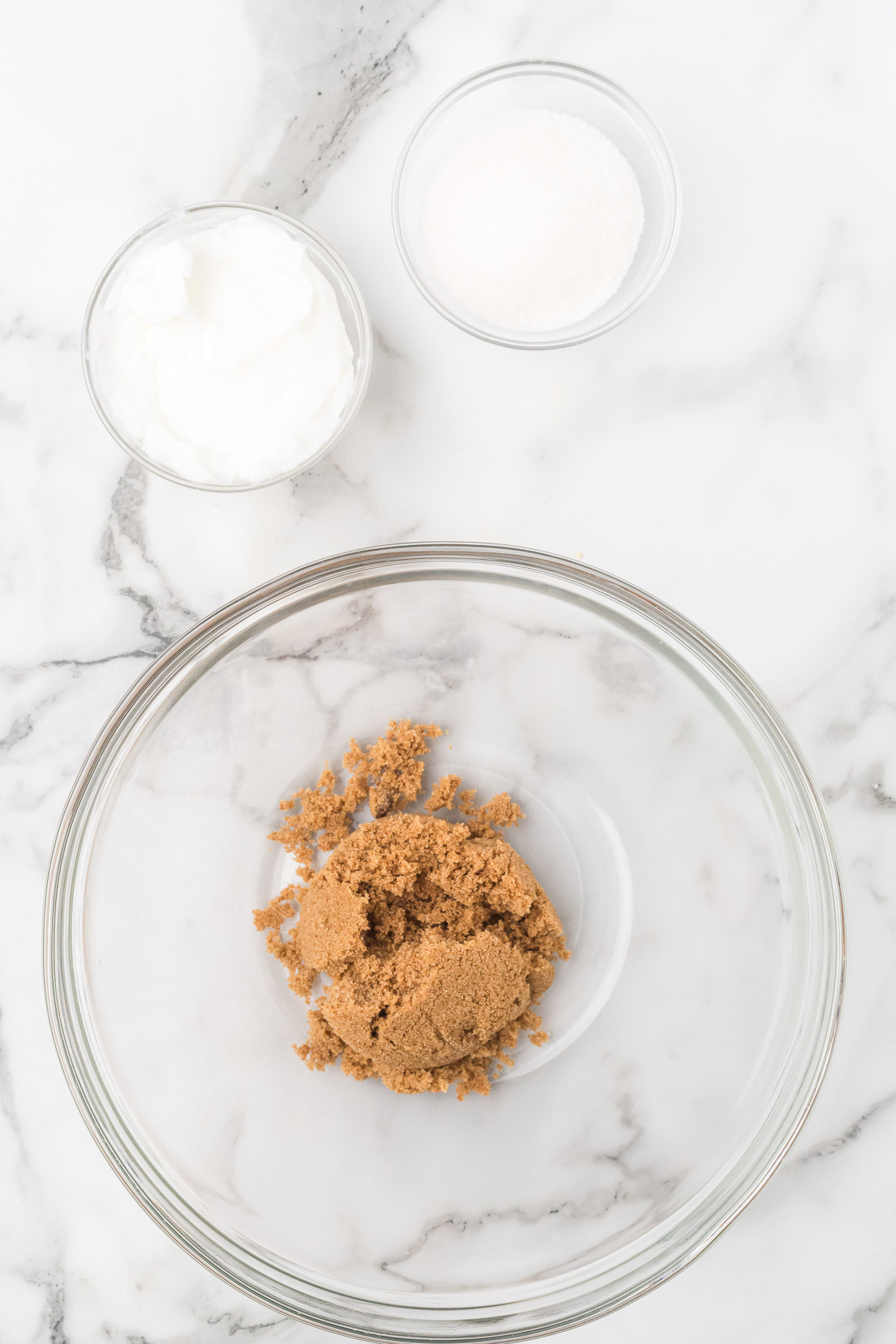 Shortening and sugars in a mixing bowl for sourdough skillet cookie.