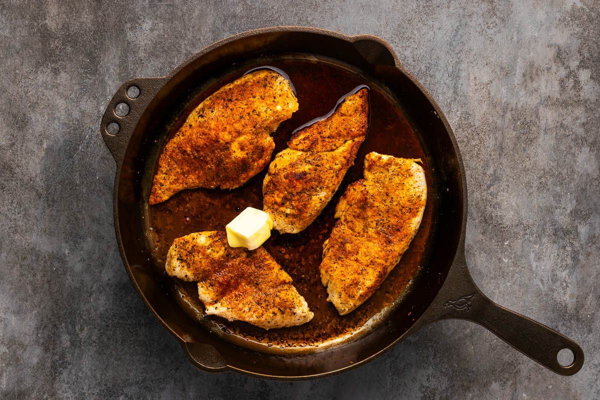 Butter added to the cooked chicken.