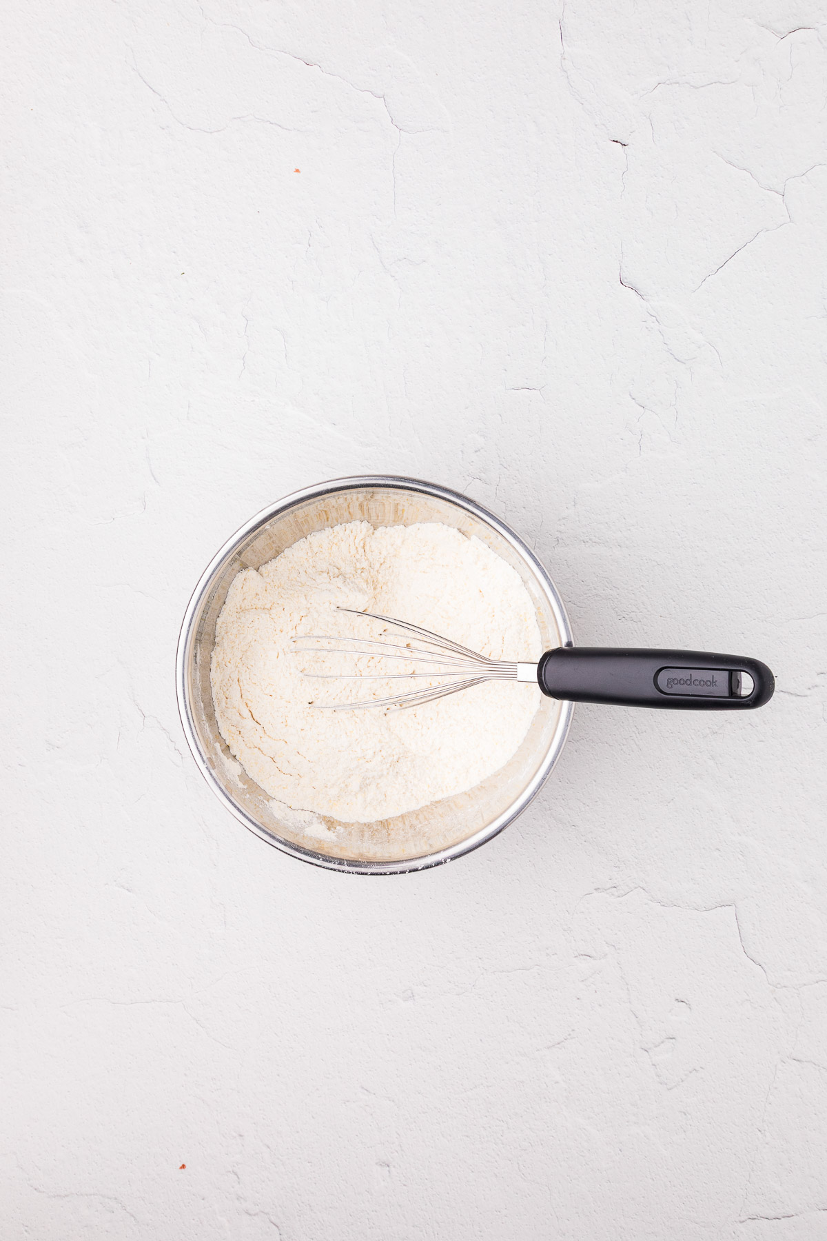 Flour and cornmeal coating mixture in a shallow dish