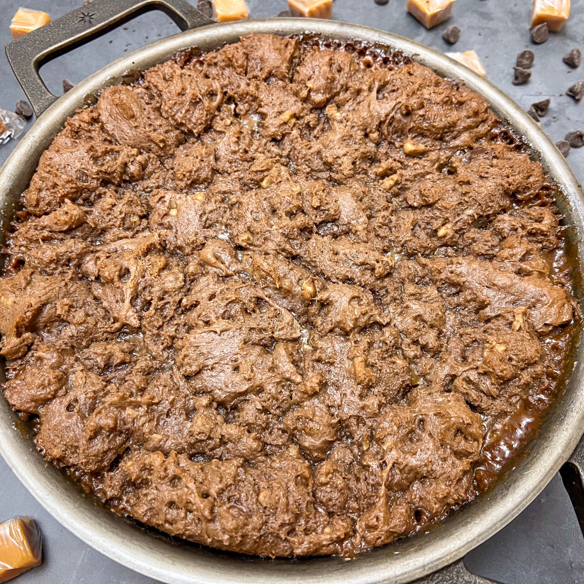Cast iron skillet caramel brownies ready to serve