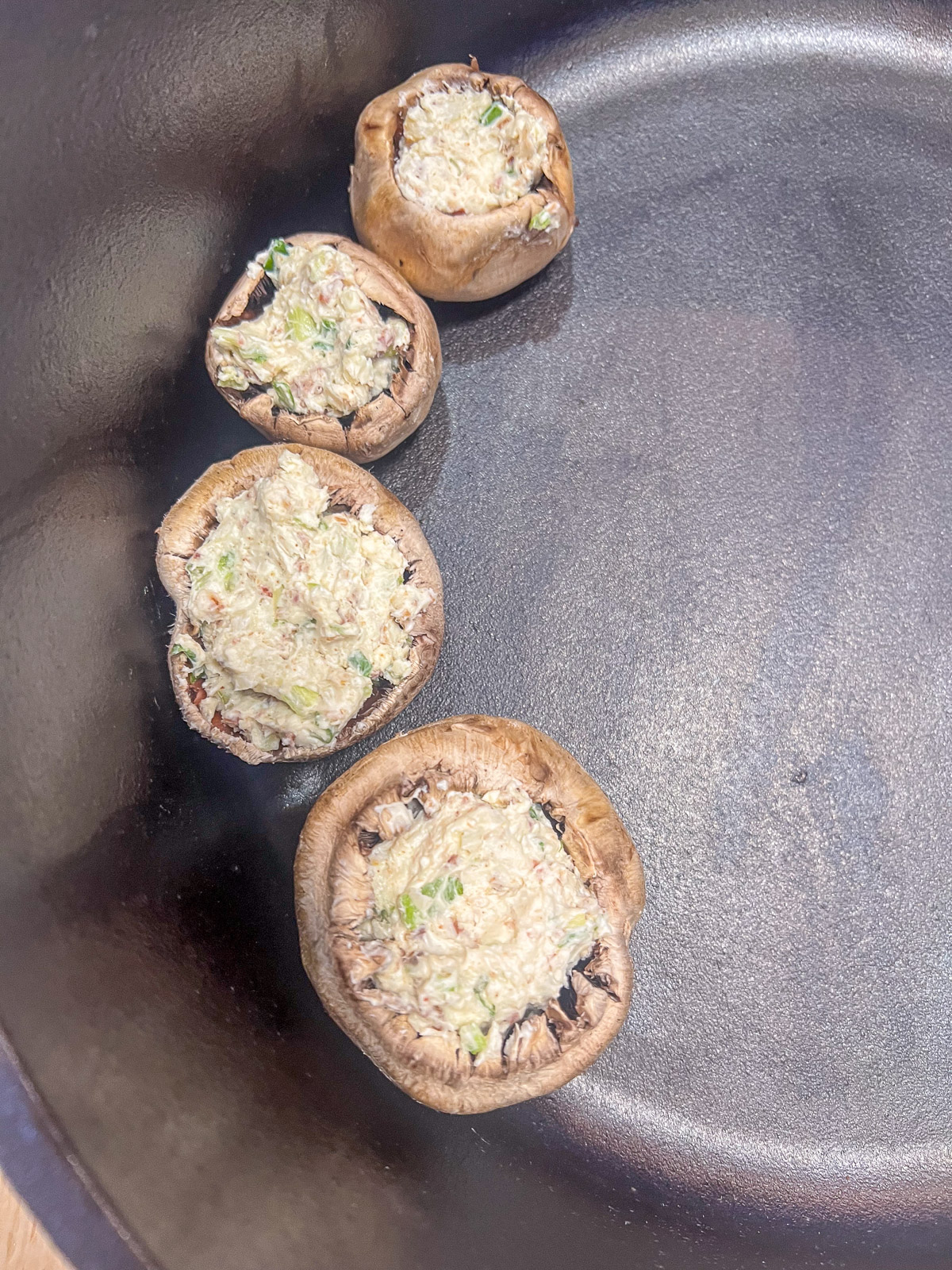 Mushroom caps filled with cream cheese, bacon, and blue cheese filling.