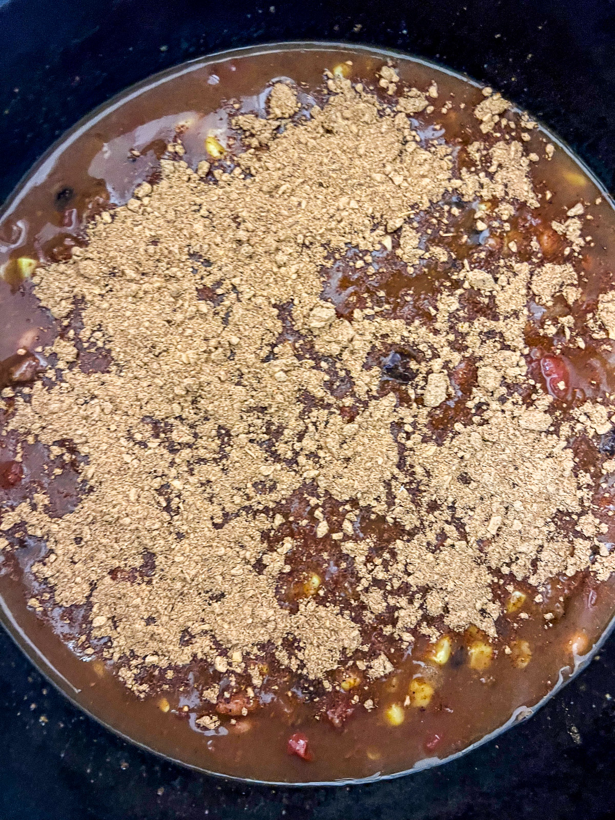 Taco seasoning stirred into dutch oven 7 can soup ingredients