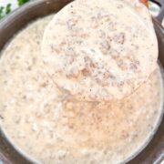 Easy sausage gravy recipe made from scratch in a cast iron skillet.