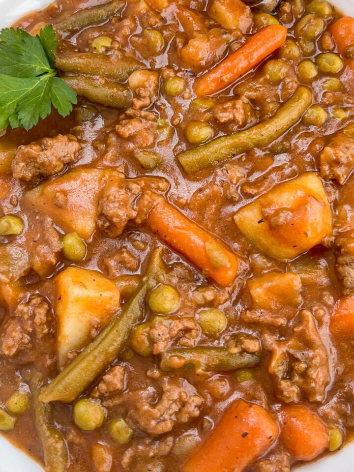 Close up of a bowlful of ground beef stew.