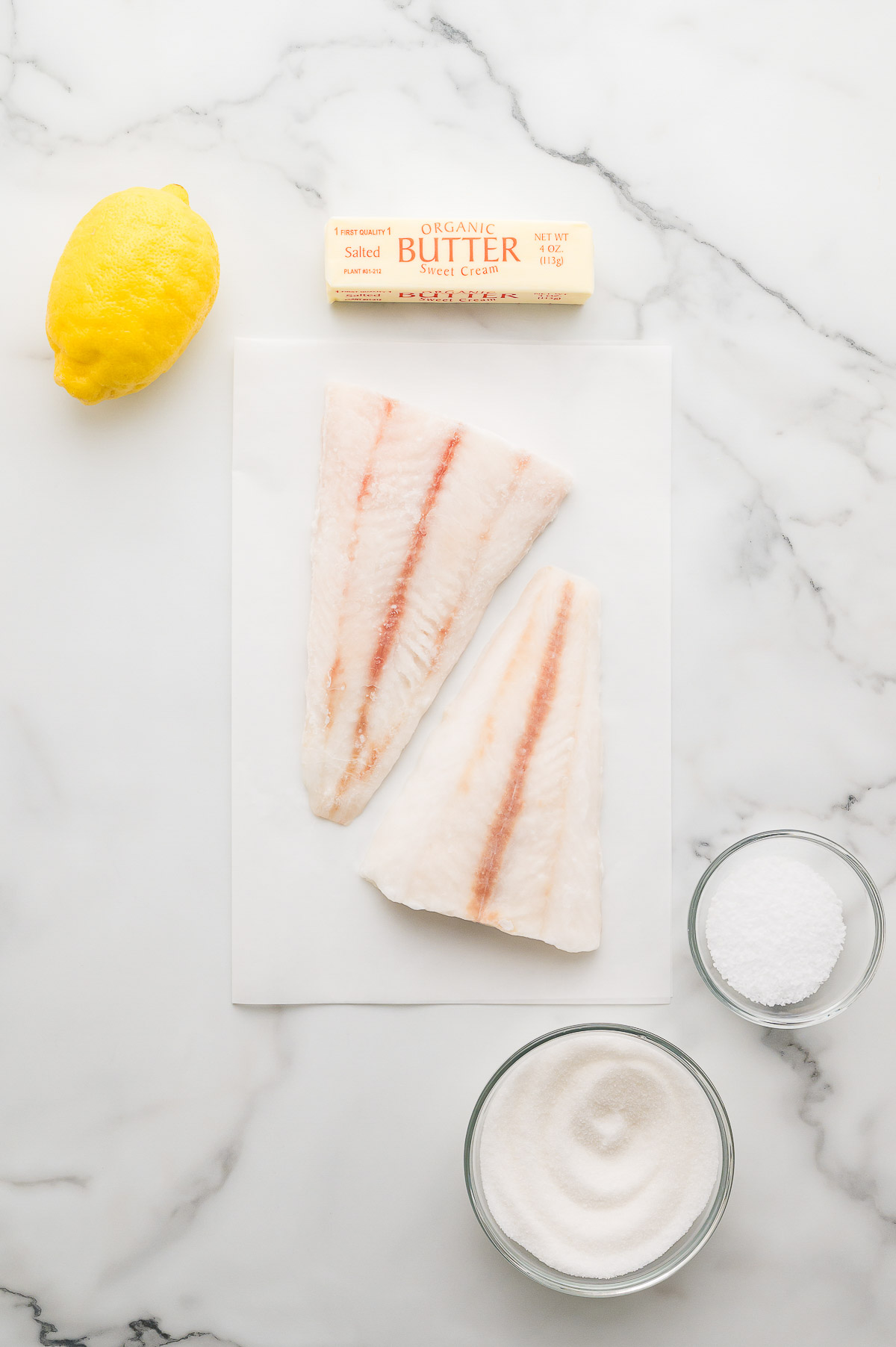 Ingredients for poor mans lobster cod fillets butter lemon sugar and salt
