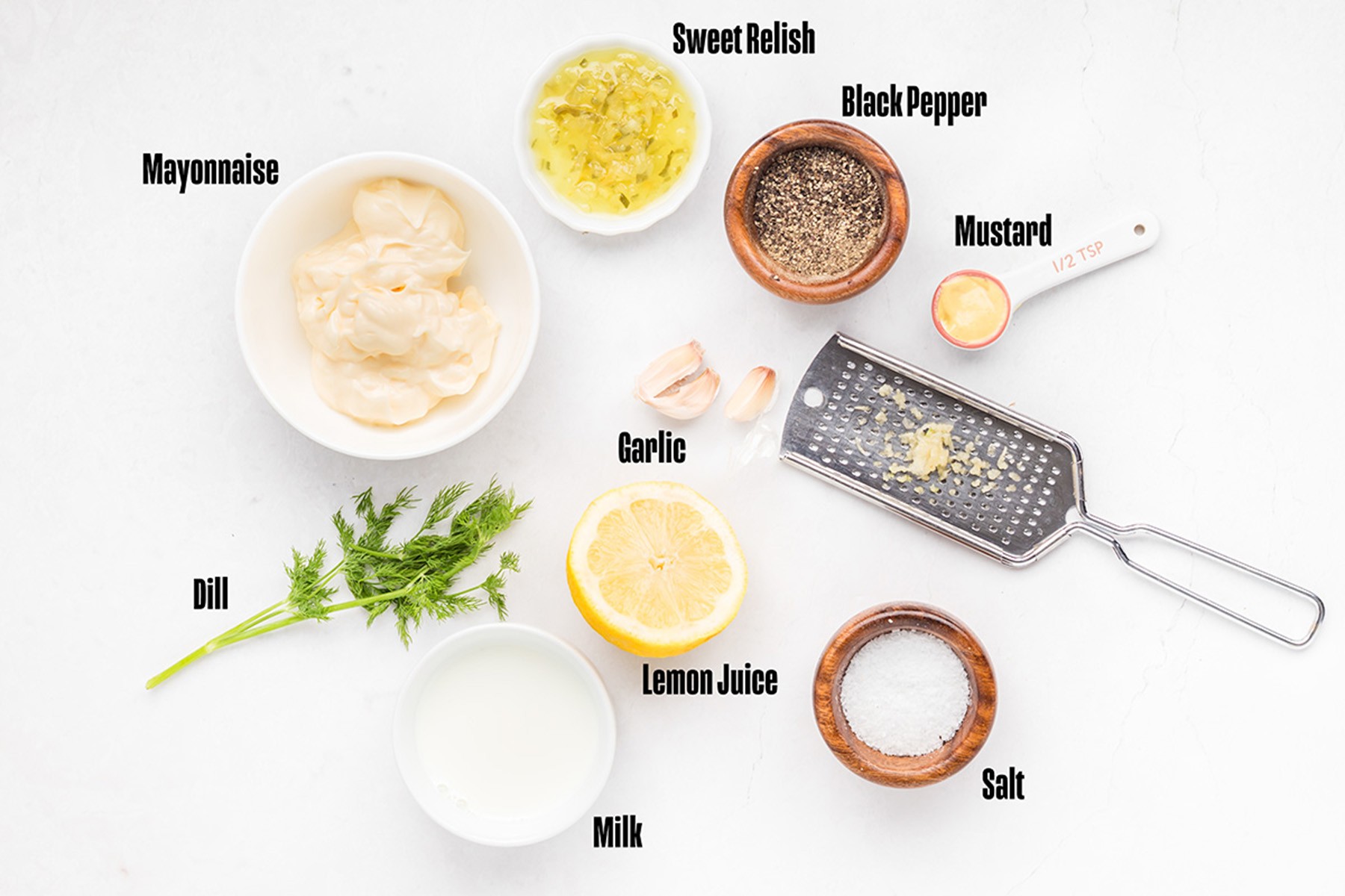 Tartar sauce ingredients: mayonnaise, sweet relish, black pepper, Dijon mustard, garlic, lemon juice, milk, dill, and salt