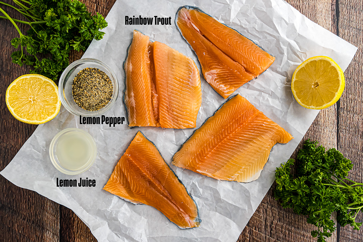 Grilled rainbow trout recipe ingredients: rainbow trout fillets, lemon pepper seasoning, and fresh lemon juice