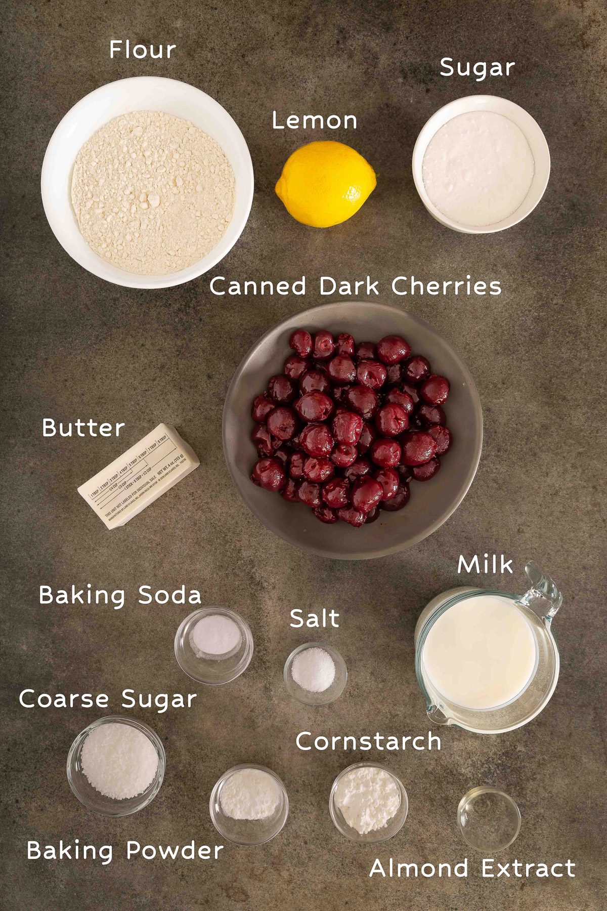 Labeled ingredients for cast iron cherry cobbler made with canned cherries