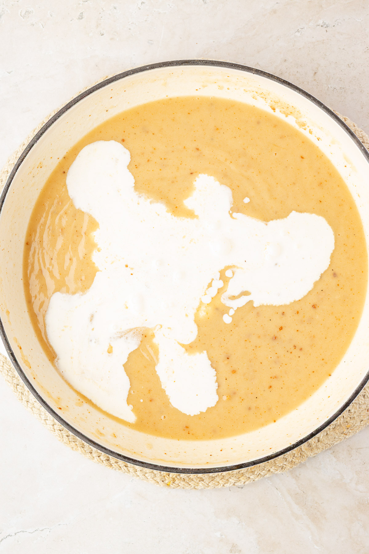 Heavy cream stirred into the skillet sauce