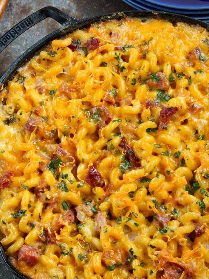 Mac and cheese with ham baked in a cast iron skillet