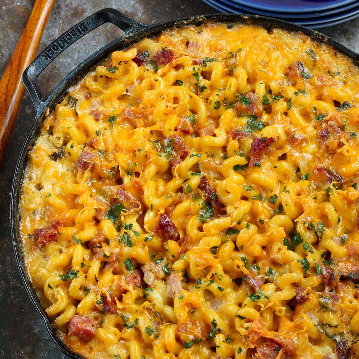 Mac and cheese with ham baked in a cast iron skillet