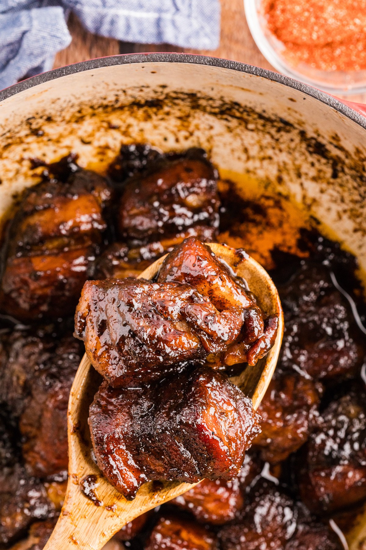 Overhead Dutch oven of finished pork belly burnt ends